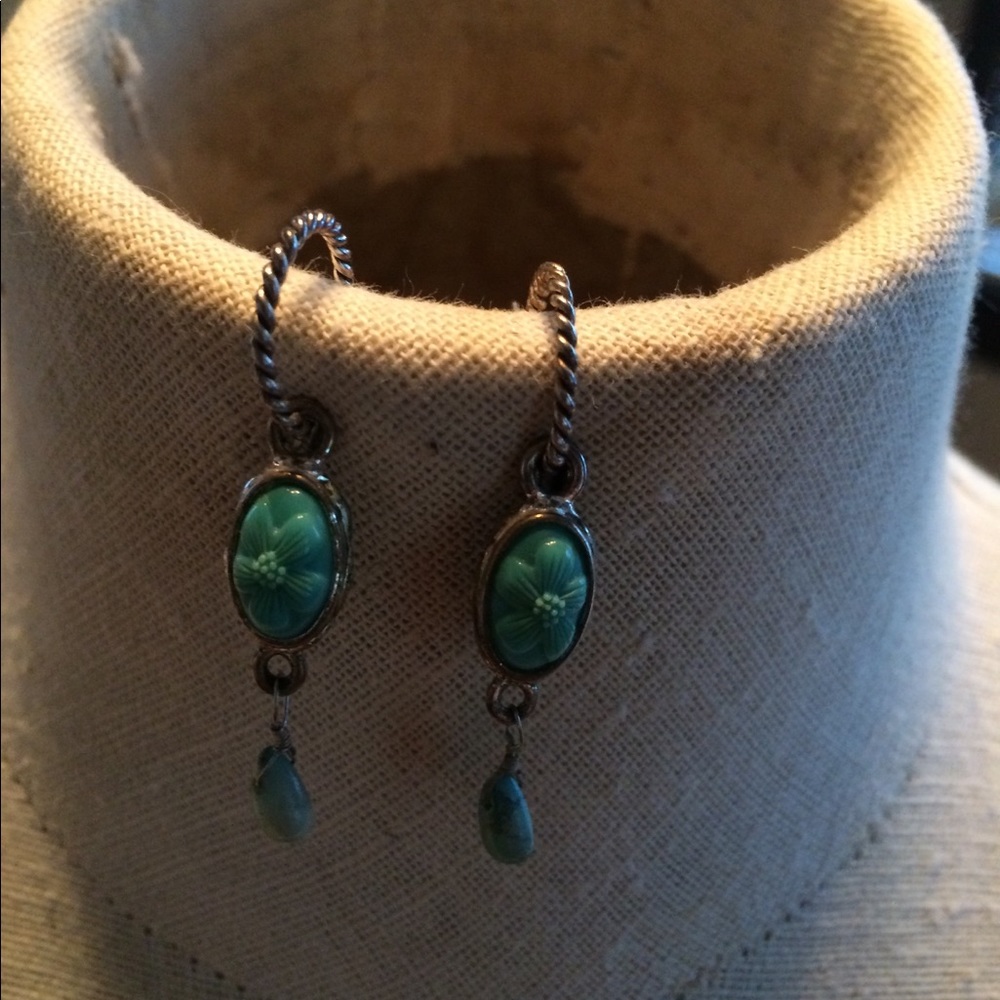 Small hoop dangles with floral imprint stone